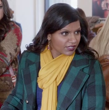 Mindy's green check coat and yellow scarf on The Mindy Project