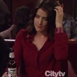 Robin’s longsleeved red shirt with leather detail on How I Met Your Mother