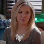 Alex’s grey cable knit sweater and silver plate/bib necklace on Happy Endings