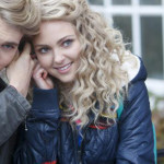 Carrie’s blue puffer jacket with rainbow patches on The Carrie Diaries