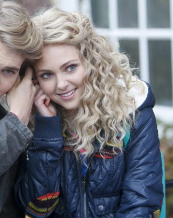 Carrie's blue puffer jacket with rainbow patches on The Carrie Diaries