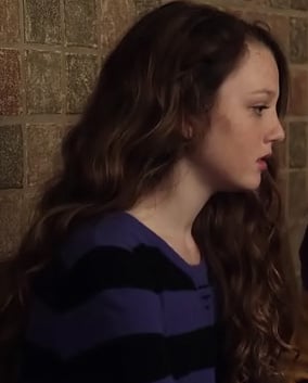 Dorrit's blue and black striped sweater dress on The Carrie Diaries