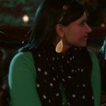 Mindy’s green sweater, black and white polka dot scarf and yellow earrings on The Mindy Project