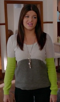 Penny's white and grey sweater with lime sleeves on Happy Endings