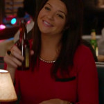 Penny’s red sweater with black trim and pocket on Happy Endings