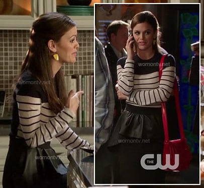 Zoe's black and white stripe top, asymmetrical leather peplum skirt and yellow earrings on Hart of Dixie