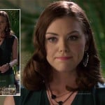 Annabeth’s green wrap top and black arrow shaped earrings on Hart of Dixie