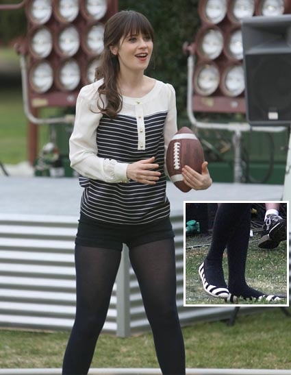 Jess's black/navy and white striped long sleeve blouse on New Girl
