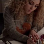 Carrie’s grey squirrel sweater on The Carrie Diaries