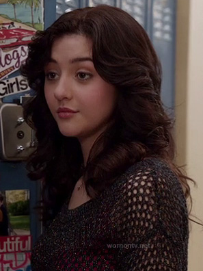 Maggie’s black mesh netting top over a pink tank top on The Carrie Diaries