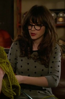 Jess’s grey and black polka dot sweater on New Girl