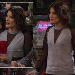 Robin’s grey sweater with black sheer sleeves and triangle insert and red purse on How I Met Your Mother