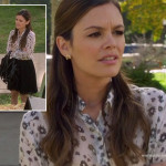 Zoe’s white/black floral shirt and gold horseshoe earrings on Hart of Dixie