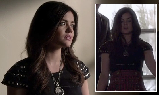 Aria's black top with studded sleeves and red striped skirt on Pretty Little Liars