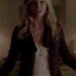 Caroline’s white textured peplum top and purple cardigan on The Vampire Diaries