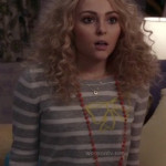 Carrie’s grey and white sweater with yellow bow on The Carrie Diaries