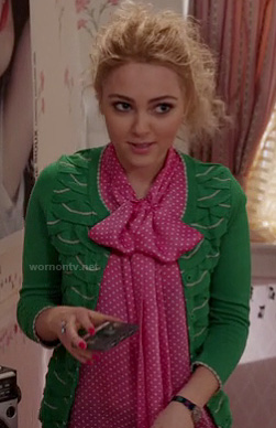 Carrie's pink polka dot blouse and green cardigan on The Carrie Diaries