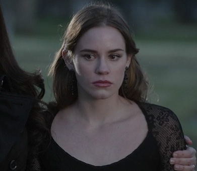 Charlotte’s black long sleeved lace dress at the funeral on Revenge