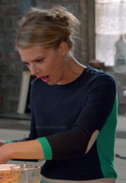 Jane's navy blue and green sweater with elbow patches on Happy Endings