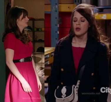 Jess's pink/magenta dress with navy coat and blue and white crossbody bag on New Girl