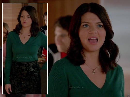 Penny's green v-neck sweater and black jacquard skirt with damask print on Happy Endings