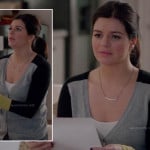 Penny’s grey, black and yellow colorblock cardigan and silver bar necklace on Happy Endings