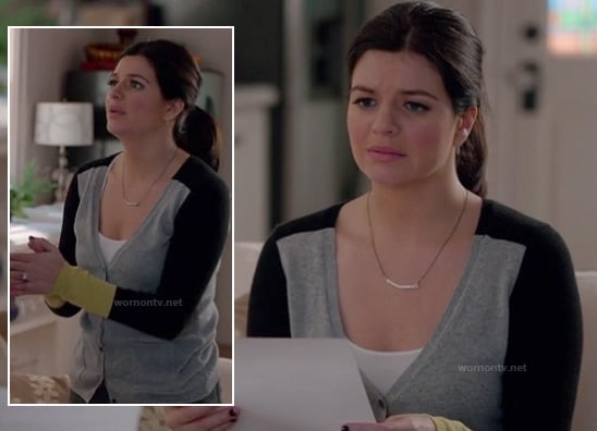 Penny’s grey, black and yellow colorblock cardigan and silver bar necklace on Happy Endings