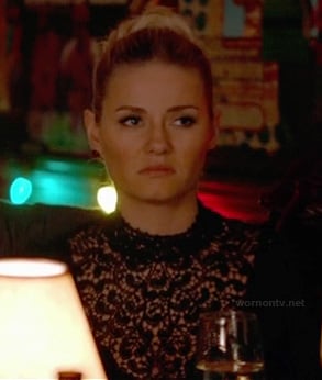 Alex's black lace turtleneck top on Happy Endings