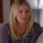 Alex’s purple knit sweater with neon orange trim on Happy Endings