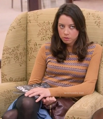 April's beige sweater with green patterned stripes on Parks and Rec