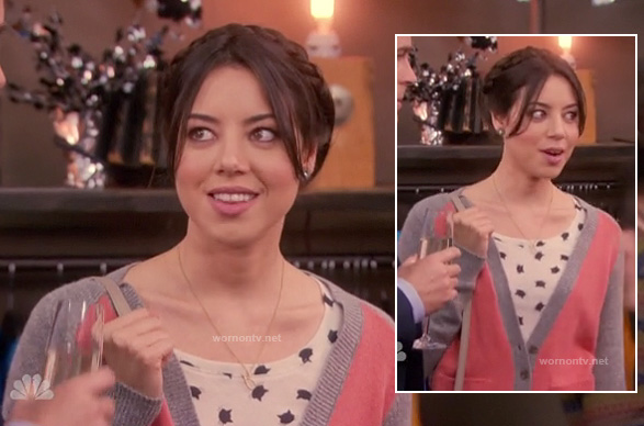 April's cat print shirt and pink and grey cardigan on Parks & Recreation