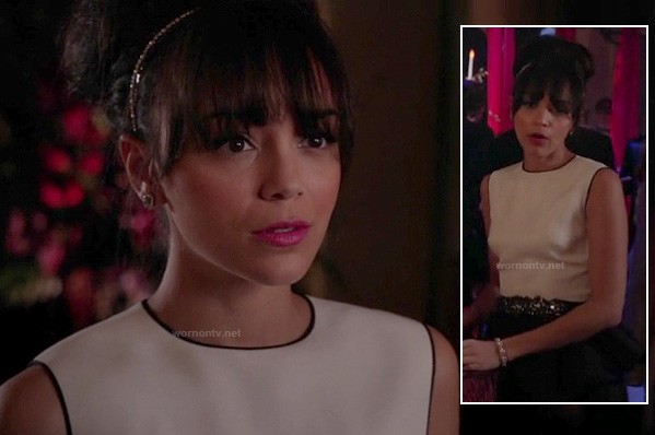 Ashley's black and white peplum dress at the masquerade party on Revenge