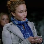 Juliette’s grey denim moto jacket and blue tie-dye scarf on Nashville