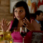 Mindy’s pink bandage dress and hoop earrings on The Mindy Project