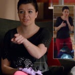 Penny’s black top with eyelet sleeves and red jeans on Happy Endings