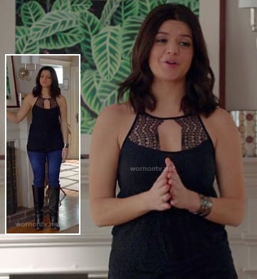 Penny's navy/black lace keyhole top worn with jeans and boots on Happy Endings