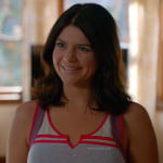 Penny’s grey tank top with pink and purple trim and sideways heart necklace on Happy Endings