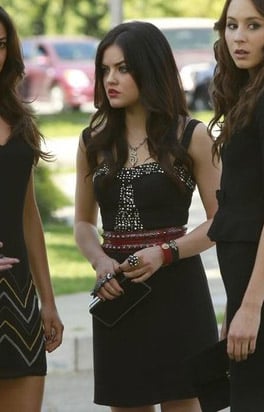 Aria’s black beaded dress with red studded belt at the funeral on Pretty Little Liars