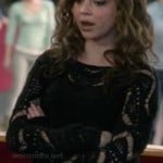 Haley’s black loose knit sweater on Modern Family