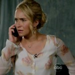 Juliette’s white floral v-neck blouse on Nashville