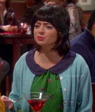 Lucy's green butterfly print top with peter pan collar on The Big Bang Theory