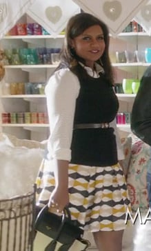 Mindy's yellow geo print skirt with white shirt on The Mindy Project