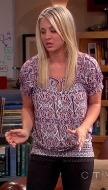 Penny's purple printed peasant style top on The Big Bang Theory