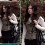 Aria’s khaki vest with pleated skirt and studded backpack on Pretty Little Liars