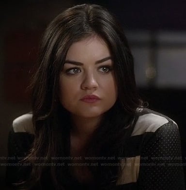Aria's black and white striped tee with perforated sleeves on Pretty Little Liars