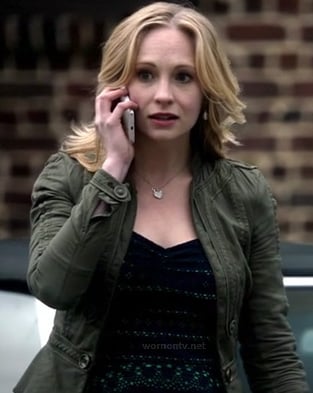 Caroline's army green peplum jacket and navy/green lace top on The Vampire Diaries