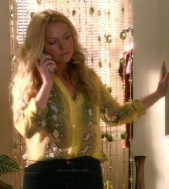 Chloe’s yellow snake print blouse on The Goodwin Games