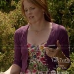 Daphne’s floral dress, purple cardigan and gold flower necklace on Switched at Birth