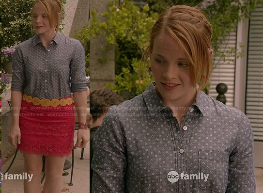 Daphne’s red lace skirt, yellow flower belt and chambray dot print shirt on Switched at Birth