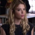 Hanna’s blue and black sheer panel top and oversized triangle earrings on Pretty Little Liars